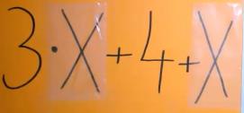 כרטיסייה עם הביטוי 3·X+4+X ושקיות שקופות מעל האותיות